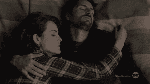 Letty and Javier sleeping together lovingly.