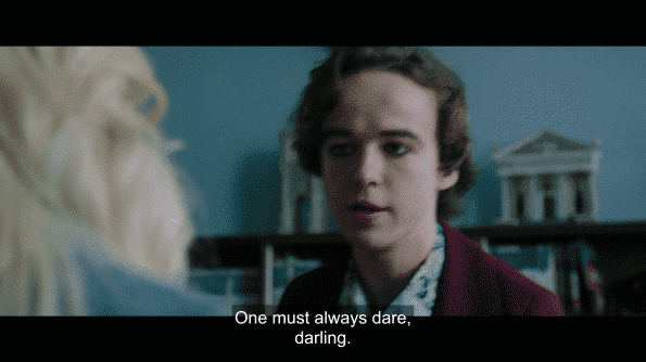 Alex Lawther as Billy saying "One must always dare, darling."