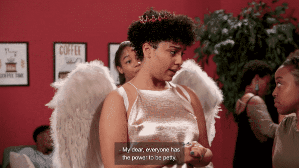 Nyla Wissa as the Petty Angel letting Quinta know: Everyone has the power to be petty.