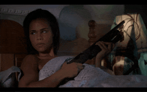 A character's girlfriend readying her shotgun when told she is just top 3, in terms of sex.
