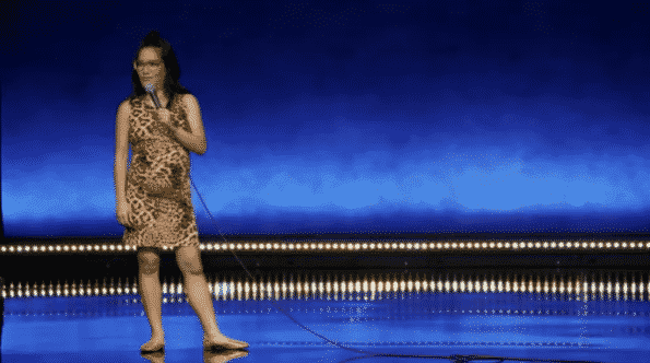 Ali Wong standing on stage.