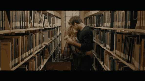 Deanna and Jack making out in the library.