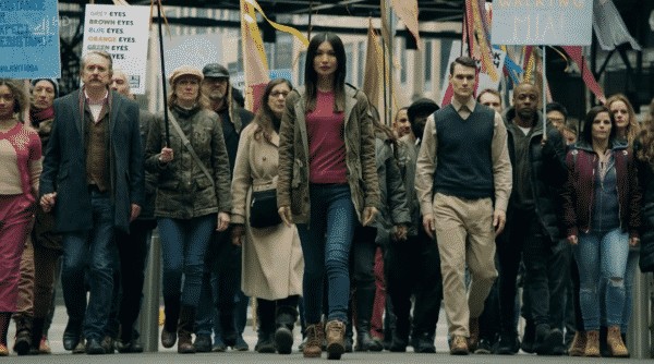 Mia leading a march for her voice to be heard in the Dryden commission.