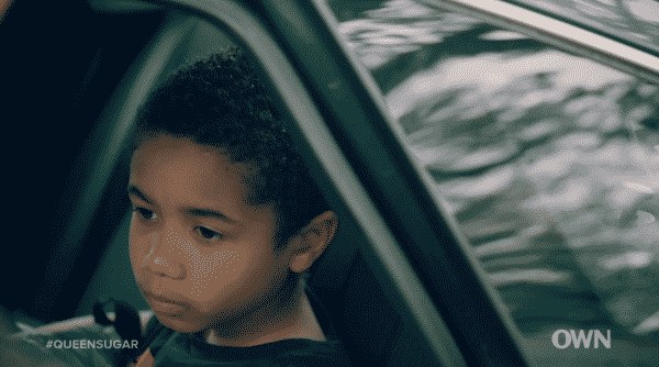 Blue in the car, slowly realizing his parents may not end up together.