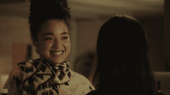 Kat smiling at Adena.