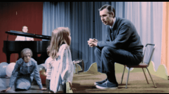 Fred Rogers speaking to a child.