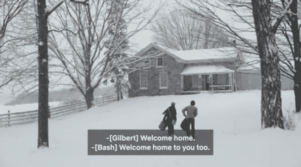 Gilbert and Sebastian walking up to Gilbert's house in the snow.