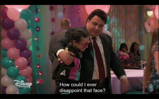 Jimmy, Tess' dad, surprising her at the father/daughter dance.