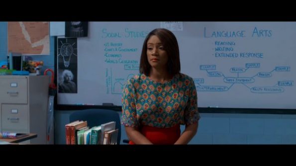 Tiffany Haddish as Carrie looking over her class.