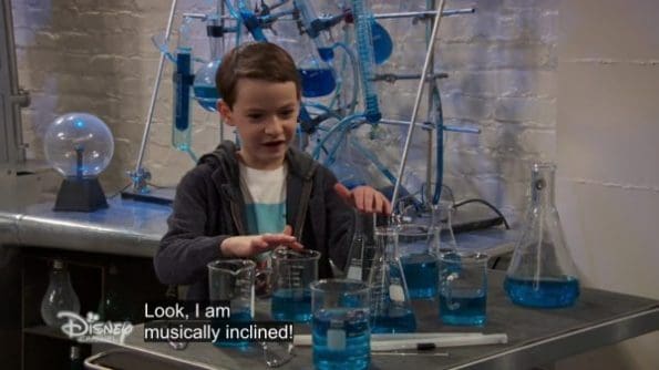 Levi playing with glass beakers and making music.
