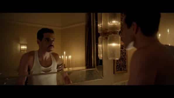 Freddie Mercury (Rami Malek) looking in the mirror before the Live Aid concert.