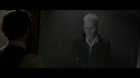 Grindelwald (Johnny Depp) being seen in a mirror.