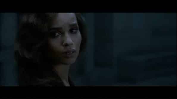 Leta (Zoe Kravitz) looking over at Newt, after it is revealed what she did as a child.
