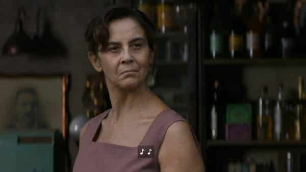 Manuela Solara (Imma Villa) looking smug about Don Achille's death.