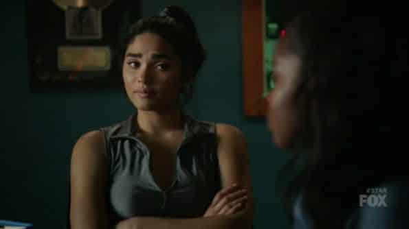 Simone looking at Alex in a worried manner.