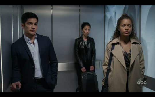 Dr. Melendez, Dr. Lim, and Claire awkwardly standing in a elevator.