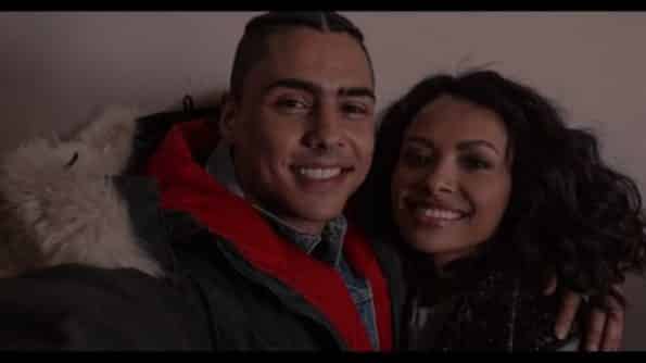  Josh (Quincy Brown) and Abby (Kat Graham) taking a picture together.