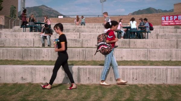 Andi and Buffy walking in opposite directions.