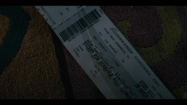 Del's bus ticket to Los Angeles.