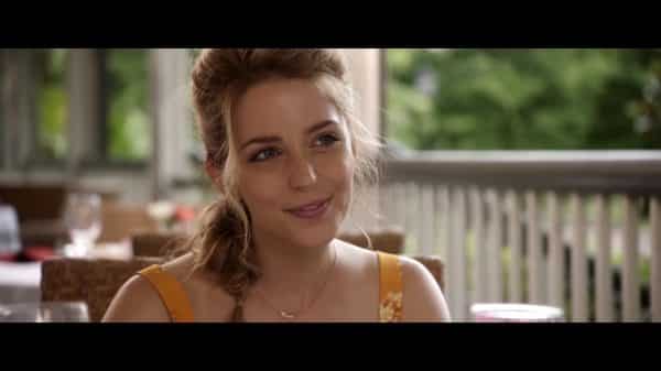 Tree (Jessica Rothe) smiling in Happy Death Day 2U.