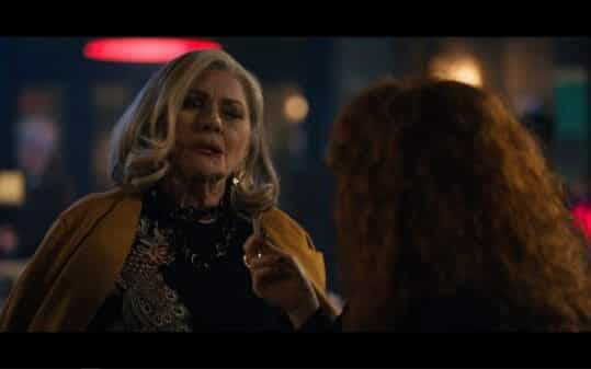 Ruth (Elizabeth Ashley) arriving fashionably late for Nadia's party.
