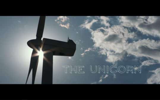 The Unicorn (2019) - Colorful Title Card featuring a windmill.