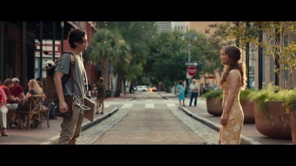 Will (Cole Sprouse) and Stella (Haley Lu Richardson) standing on a street looking at one another.