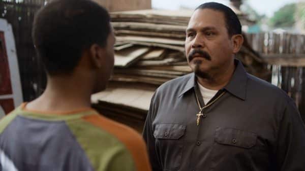 Chivo (Emilio Rivera) as Jamal tries to get flowers for Olivia's quince.