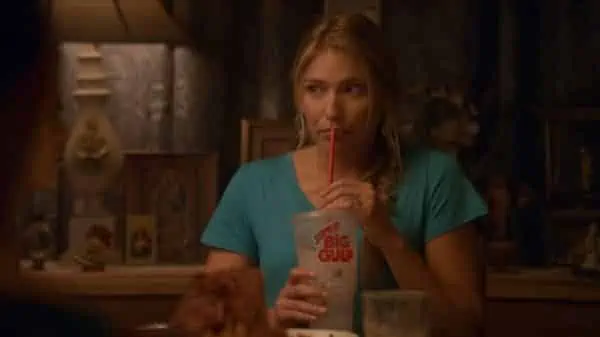 Amber (Shoshana Bush) drinking a big gulp.