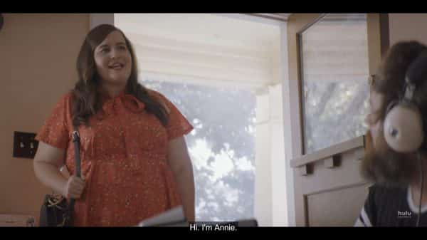 Annie (Aidy Bryant) introducing herself to Ryan's friends.