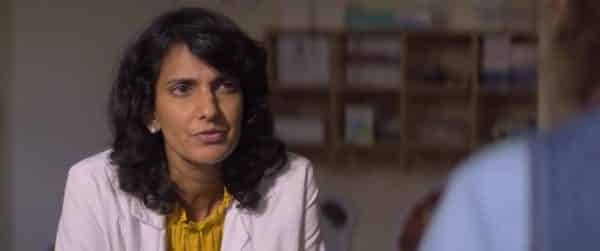 Dr. Chondra (Poorna Jagannathan) asking questions.