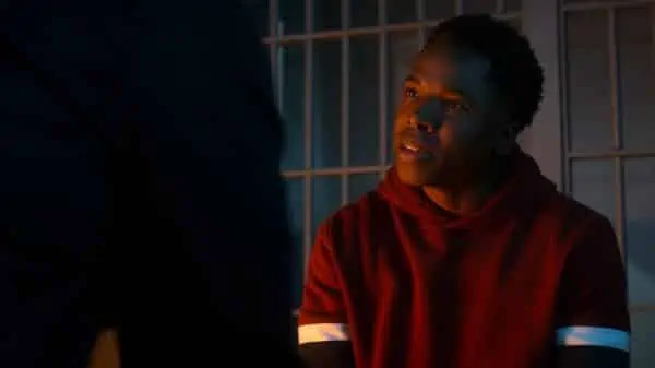 Caleb (Denny Love) talking to Amenadiel after being locked up.