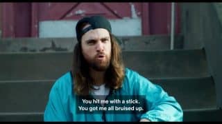 Charlie (Sam Eliad) talking about Malcolm hitting him with a stick.
