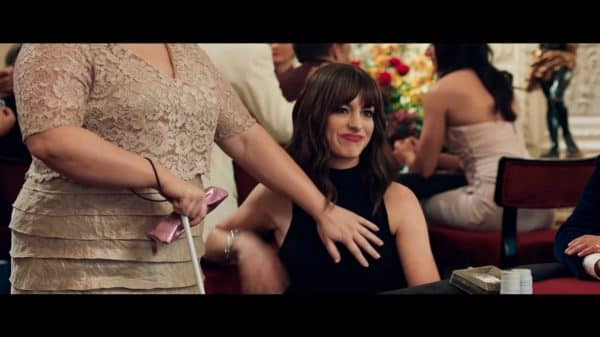 Josephine (Anne Hathaway) being felt up by Penny and jokingly called a man.