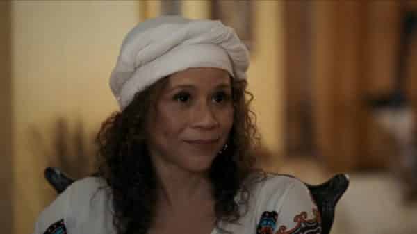 Lucy fka Tina (Rosie Perez) talking to Nola.