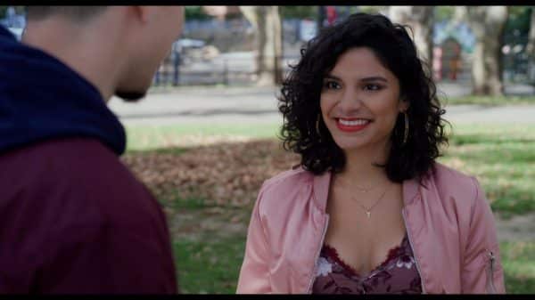 Lulu (Shakira Barrera) smiling at Malcolm.