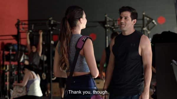 Lyn and Rudy (Adrian Gonzalez) talking at the gym.