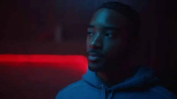 McKay (Algee Smith) listening to Nate and others trash Cassie.