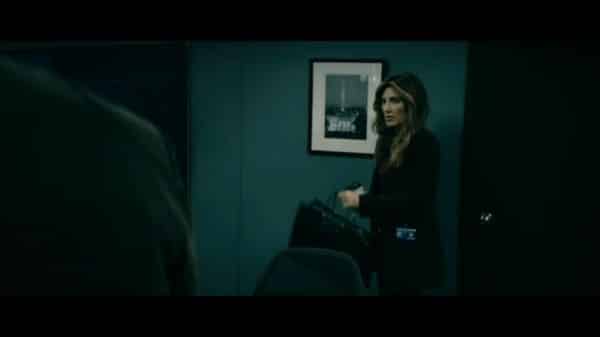 CIA Deputy Director Susan Raynor (Jennifer Esposito) finding Billy in her office.