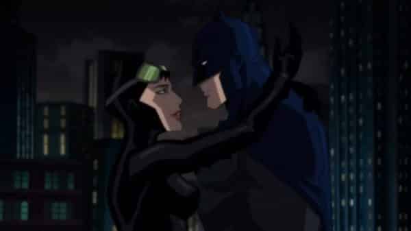 Catwoman (Jennifer Morrison) and Batman (Jason O'Mara) about to kiss.