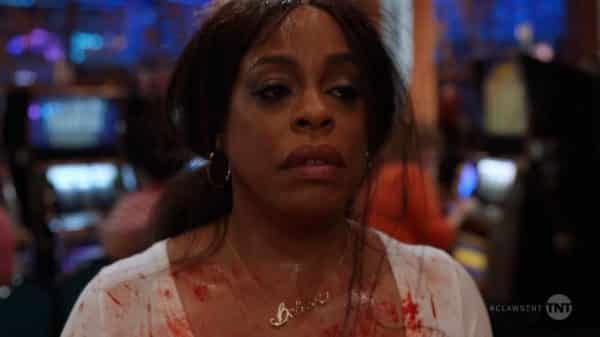 Desna (Niecy Nash), covered in blood, exhausted, and just wanting to go home.