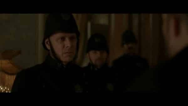 Sargent Dombey (Jamie Harris) arresting Philo.