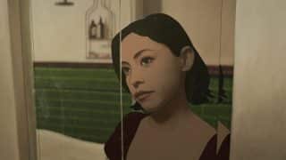 Alma (Rosa Salazar) looking in a mirror.