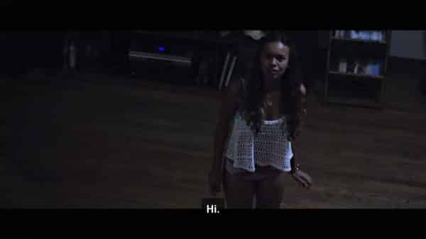 Violet (Alisha Boe), in her underwear, coming out to the living room as Ken and his wife are killed.