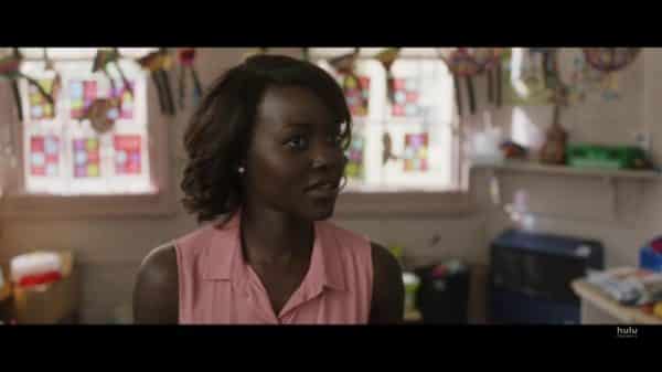 Miss Audrey Caroline (Lupita Nyong'o) talking to Dave.