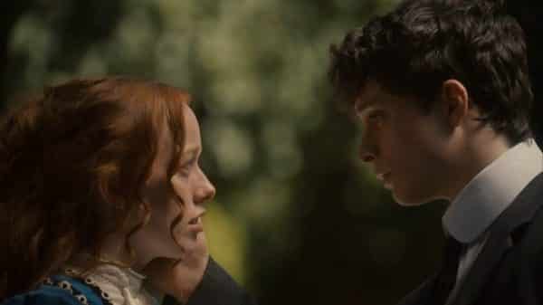 Anne and Gilbert looking intensely at each other.