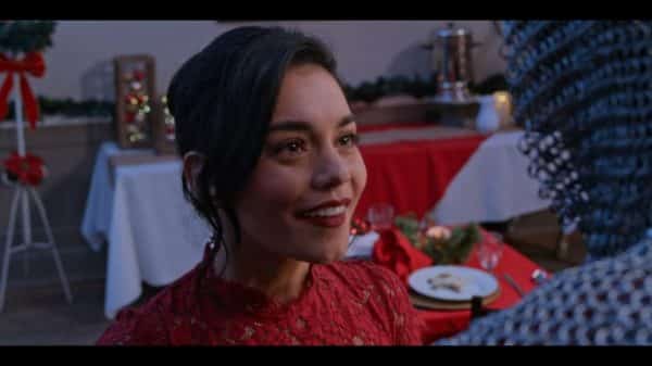Brooke (Vanessa Hudgens) dressed for a holiday party.