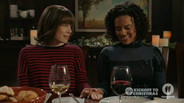 Lydia (Lee Marshall) and Anna (Genelle Williams) smiling.