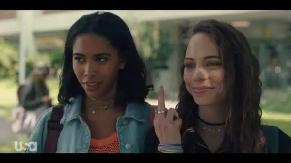 Addy (Herizen F. Guardiola) and Beth (Marlo Kelly) after school, with Beth flipping off her dad.