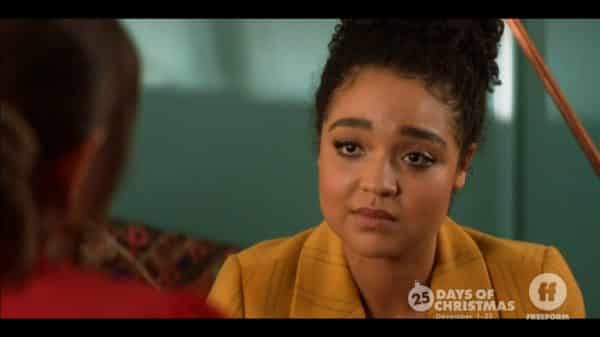 Jess (Aisha Dee) not looking excited, as she usually is.
